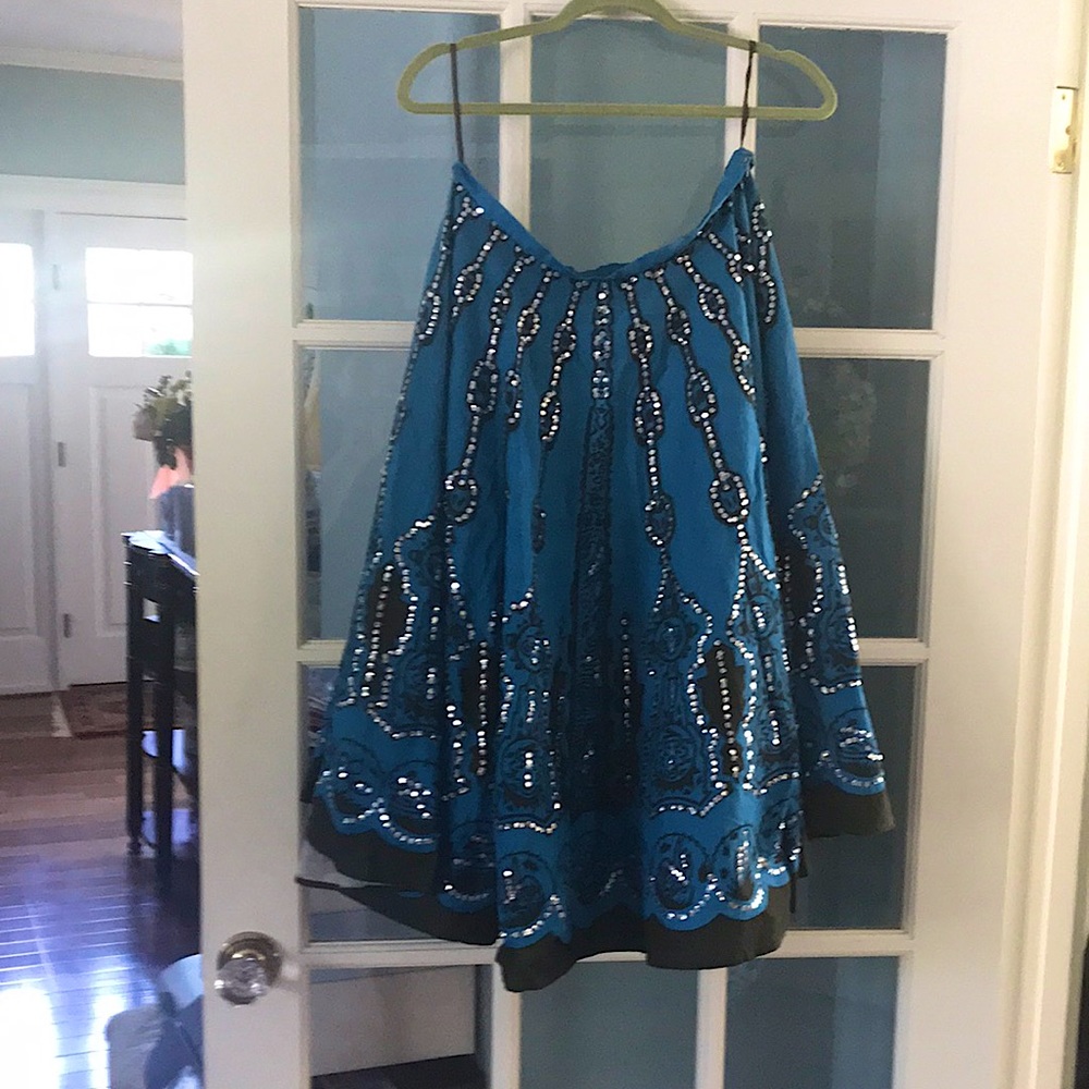 Rhinestone blue and brown lined skirt.